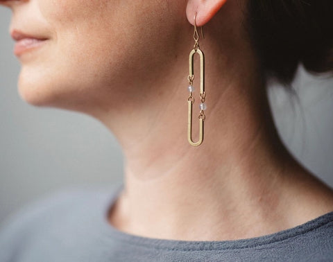 brass movement drop earrings