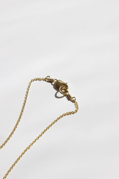 half circle gold necklace